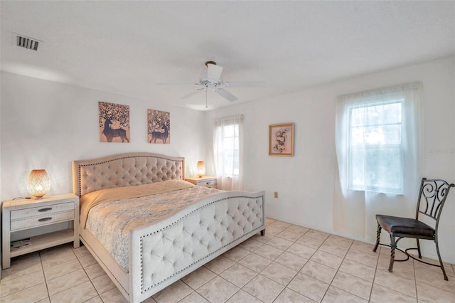 3840 Staysail Ln Unit 3840, Holiday, FL 34691 - bedroom featuring a ceiling fan and light tile patterned floors