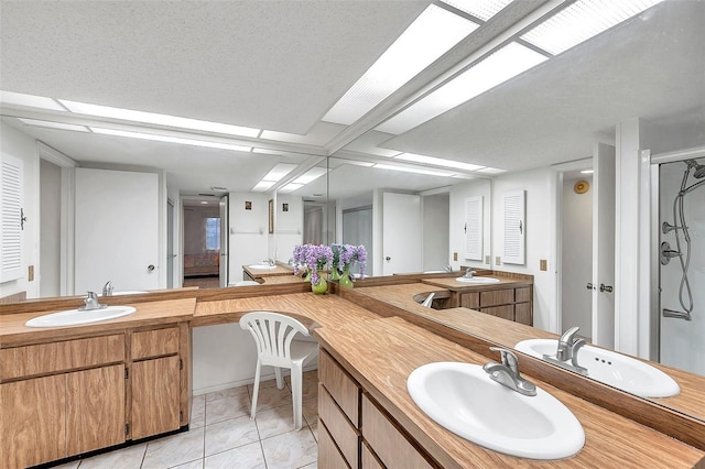 3840 Staysail Ln Unit 3840, Holiday, FL 34691 - full bathroom with double vanity, a shower stall, and tile patterned floors