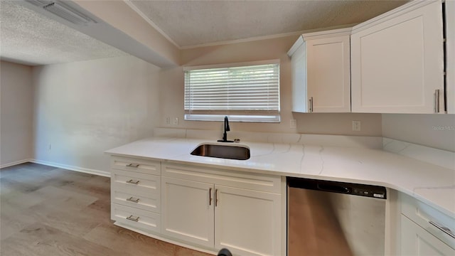 kitchen with white cabinetry, light stone countertops, a textured ceiling, dishwasher, and sink