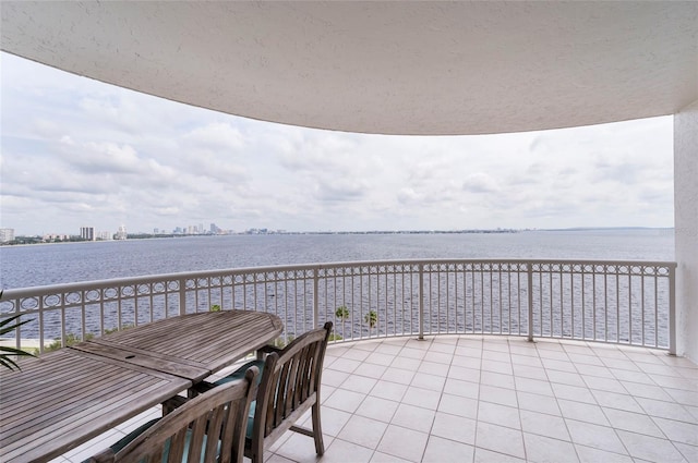 balcony featuring a water view