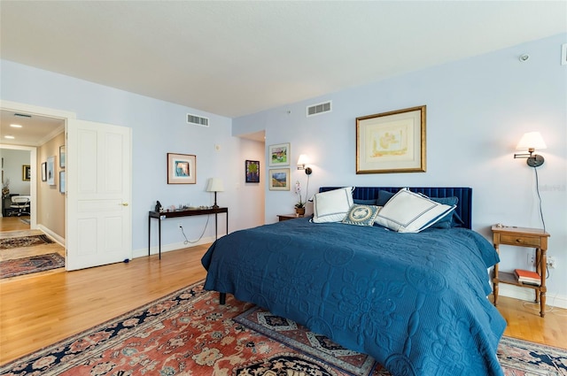 bedroom featuring hardwood / wood-style floors