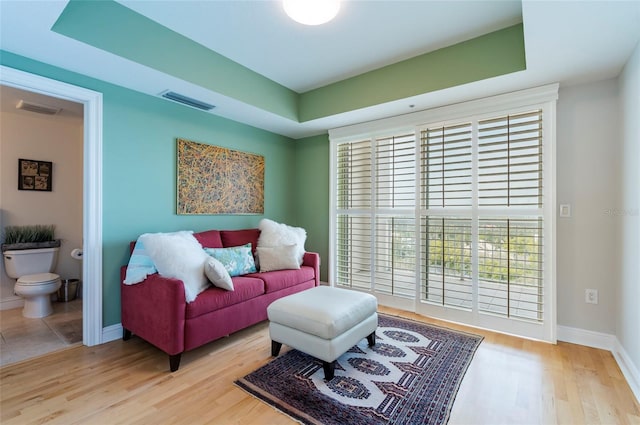 living room with light hardwood / wood-style floors