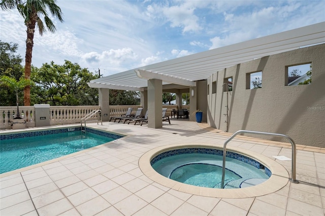 view of swimming pool featuring an in ground hot tub, a patio, and a pergola