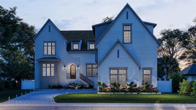 view of front of home featuring a yard