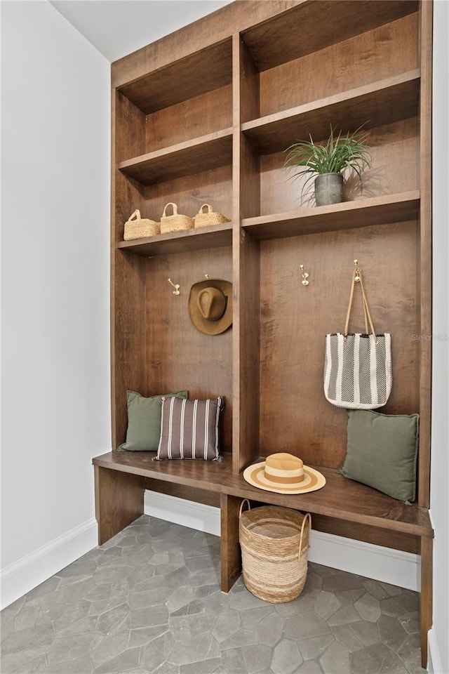 4633 W Lowell Ave, Tampa, FL 33629 - mudroom with baseboards and stone finish flooring