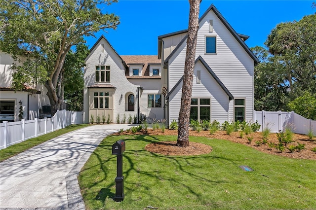 4633 W Lowell Ave, Tampa, FL 33629 - view of front of house with driveway and a gate