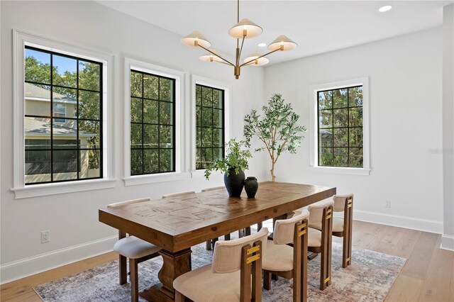 4633 W Lowell Ave, Tampa, FL 33629 - dining room featuring a chandelier, baseboards, light wood-style flooring, and recessed lighting