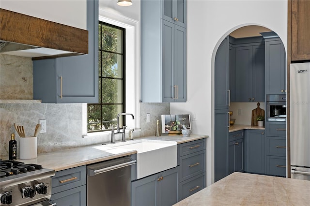 4633 W Lowell Ave, Tampa, FL 33629 - kitchen featuring appliances with stainless steel finishes, plenty of natural light, backsplash, and a sink