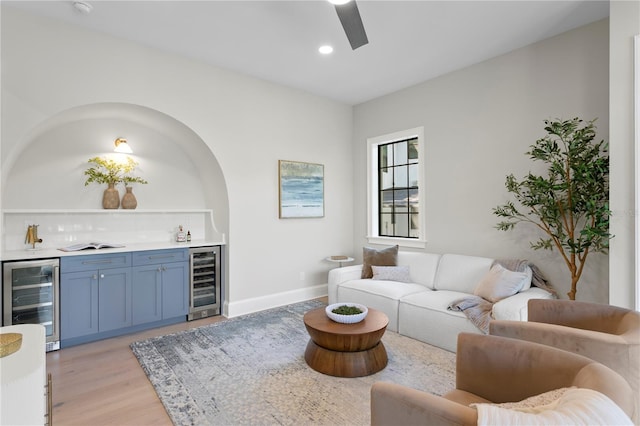 4633 W Lowell Ave, Tampa, FL 33629 - living area featuring wine cooler, wet bar, a ceiling fan, light wood-type flooring, and recessed lighting