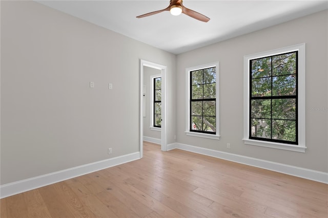 4633 W Lowell Ave, Tampa, FL 33629 - unfurnished room with light wood-style flooring, baseboards, and a ceiling fan