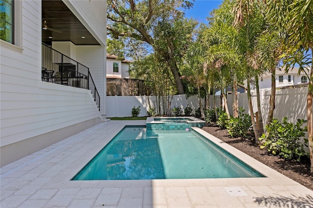 4633 W Lowell Ave, Tampa, FL 33629 - view of swimming pool with a fenced backyard, a pool with connected hot tub, and stairway