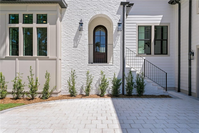 4633 W Lowell Ave, Tampa, FL 33629 - doorway to property featuring stone siding
