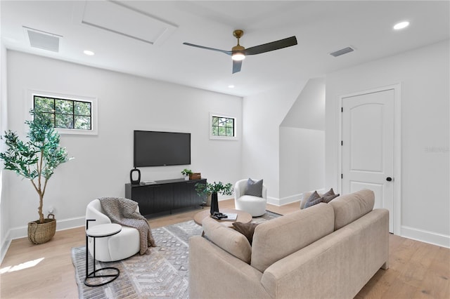 4633 W Lowell Ave, Tampa, FL 33629 - living area with light wood-style flooring, healthy amount of natural light, attic access, baseboards, and recessed lighting