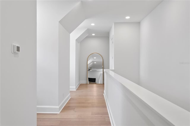 4633 W Lowell Ave, Tampa, FL 33629 - hall featuring light wood-type flooring, recessed lighting, baseboards, and an upstairs landing