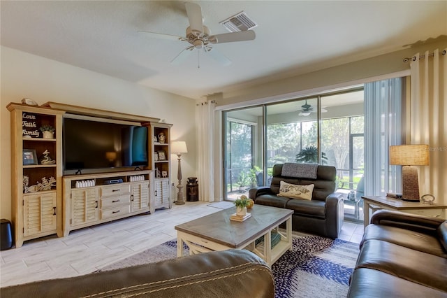 living room featuring ceiling fan