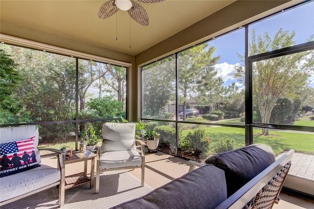 sunroom / solarium with ceiling fan