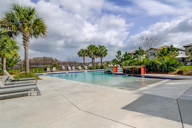 view of swimming pool featuring a patio