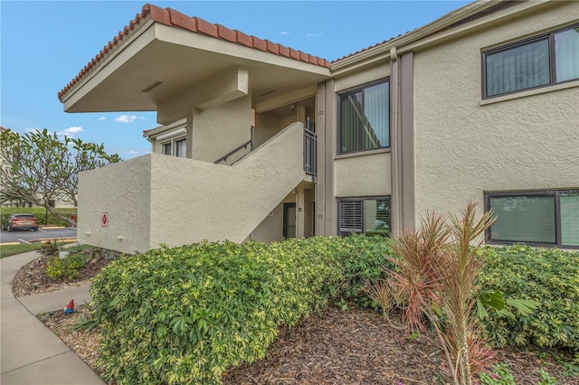 view of home's exterior featuring a balcony