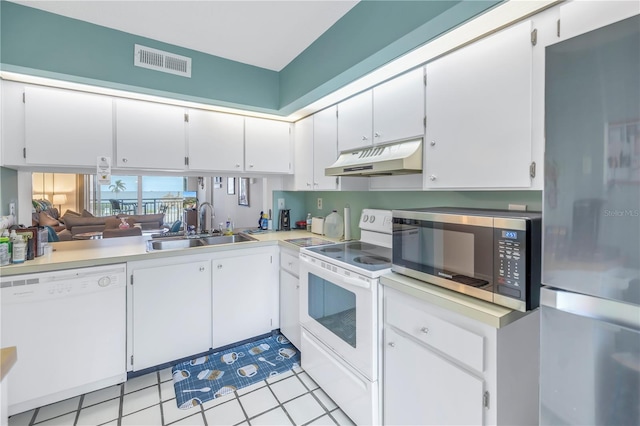 kitchen featuring white cabinetry, sink, and stainless steel appliances