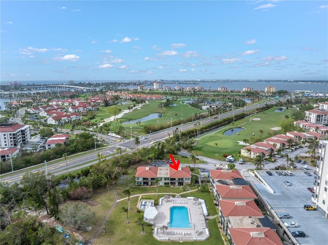 drone / aerial view with a water view