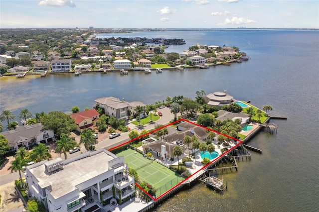 5031 W San Miguel St, Tampa, FL 33629 - aerial perspective of suburban area featuring property parcel outlined and a nearby body of water