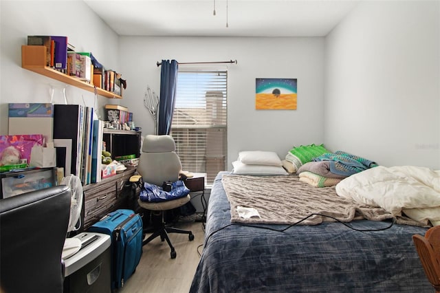 bedroom featuring light hardwood / wood-style floors