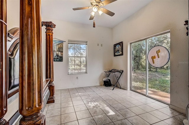 unfurnished room featuring light tile patterned flooring and ceiling fan