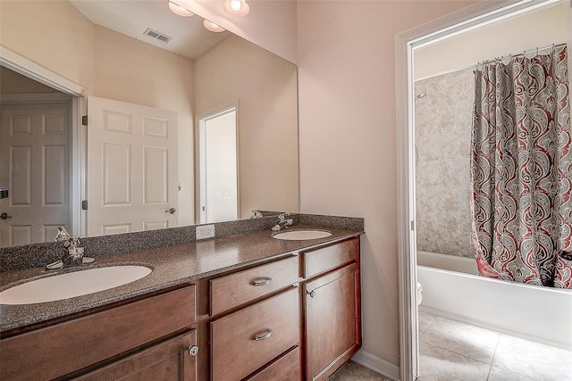 full bathroom with toilet, shower / bath combo, vanity, and tile patterned floors