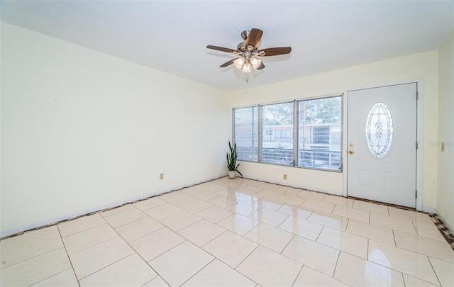 entrance foyer featuring ceiling fan