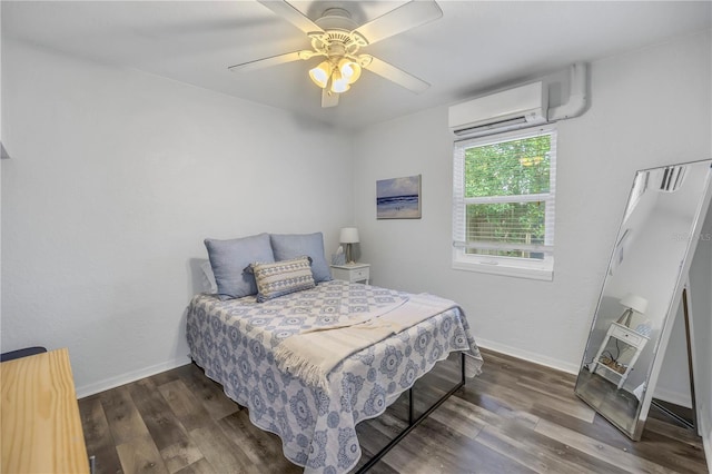 bedroom with dark wood-type flooring, ceiling fan, and a wall mounted air conditioner