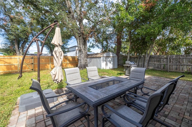 view of patio featuring a shed