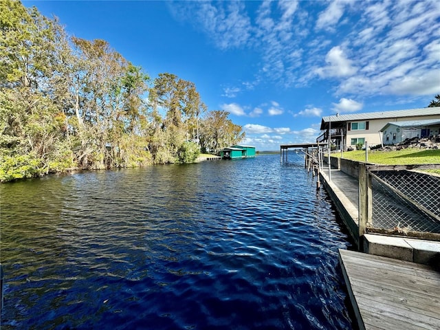 view of dock with a water view