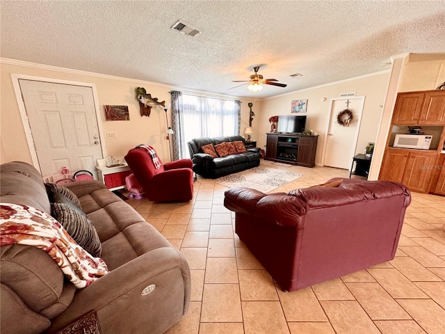 tiled living room featuring ornamental molding, lofted ceiling, a textured ceiling, and ceiling fan