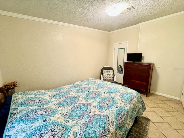 bedroom featuring tile patterned flooring, a textured ceiling, and crown molding