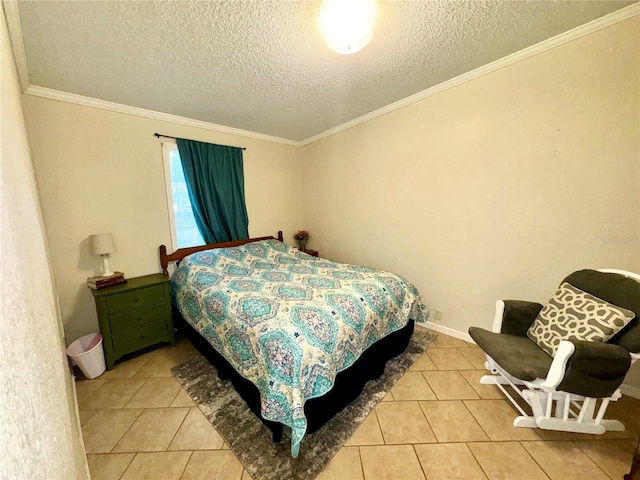 bedroom featuring a textured ceiling, tile patterned floors, and crown molding