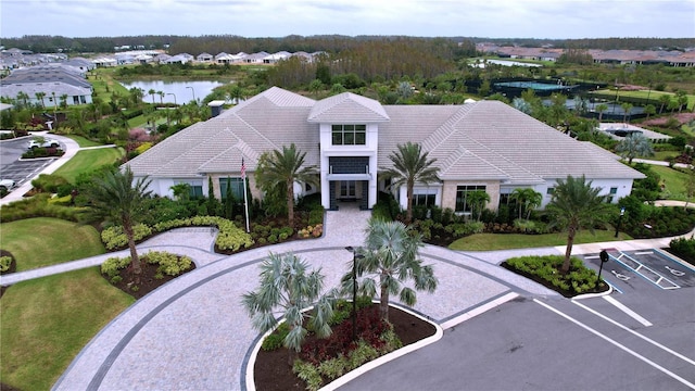 birds eye view of property featuring a water view