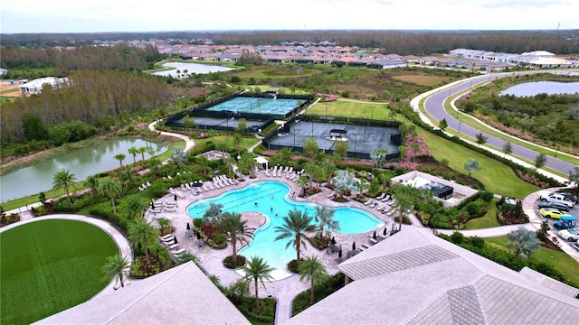 bird's eye view with a water view