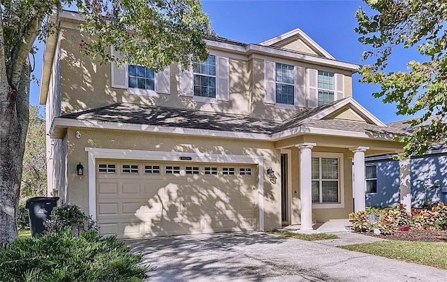 view of front of home with a garage