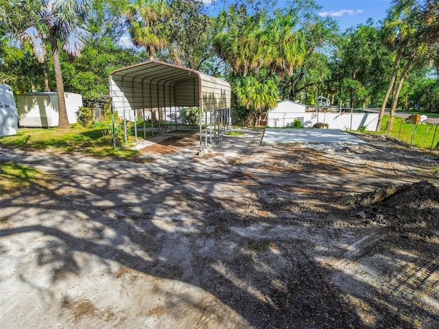 view of yard with a carport