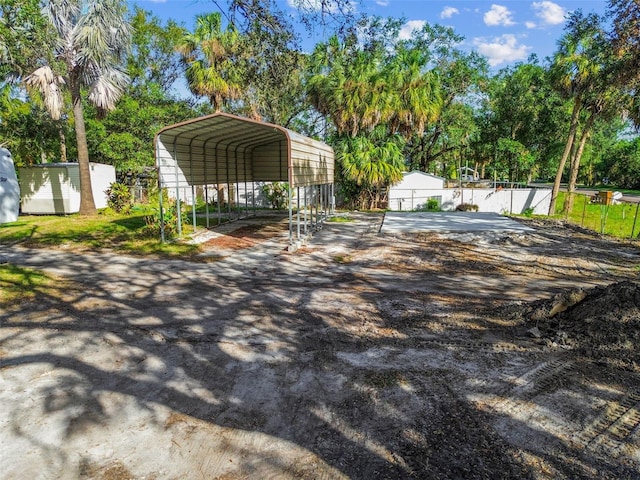 view of yard with a carport