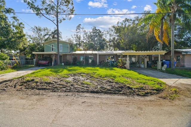 view of front facade with a carport