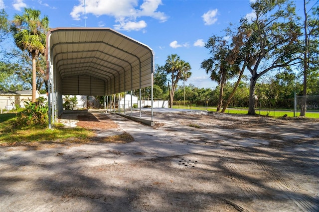 view of parking with a carport