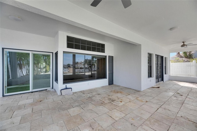 view of patio featuring ceiling fan