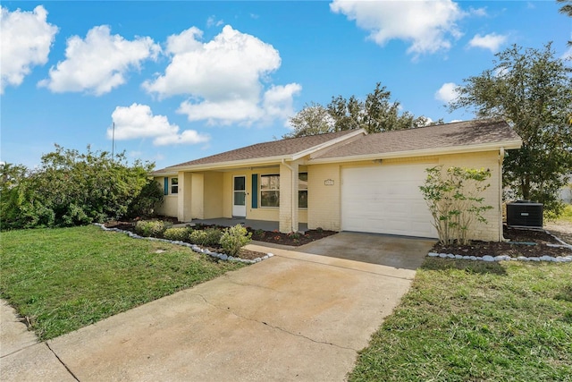 ranch-style house featuring central AC, covered porch, a front yard, and a garage