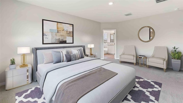 bedroom with light colored carpet and ensuite bathroom