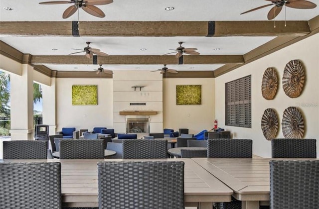 view of patio featuring an outdoor hangout area and ceiling fan