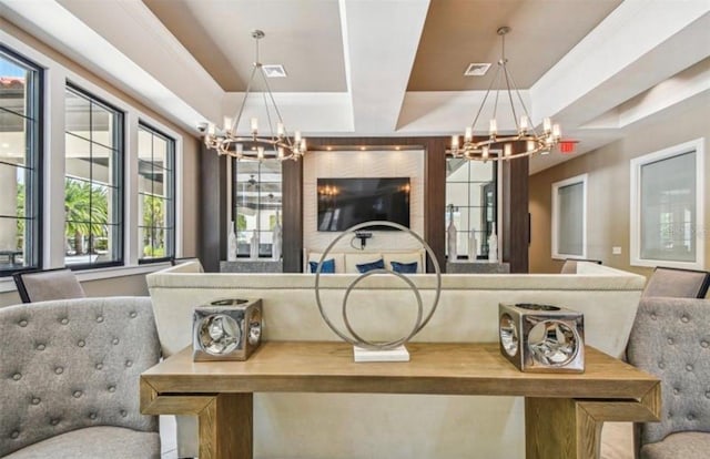 living room featuring a tray ceiling