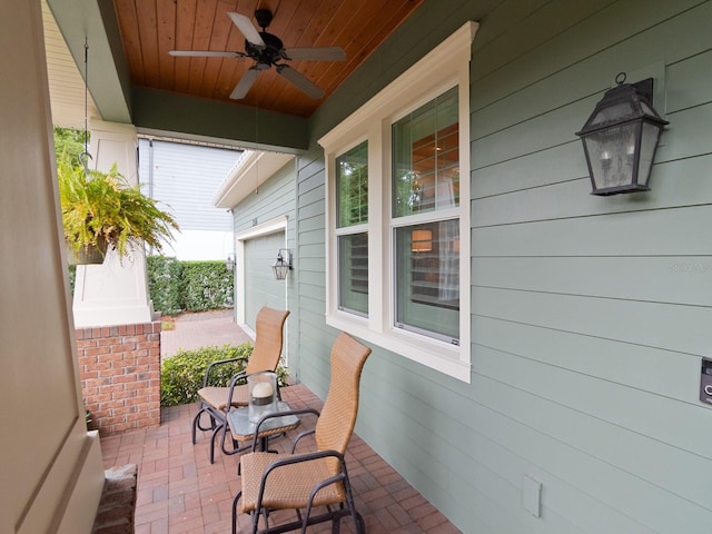 view of patio featuring covered porch and ceiling fan