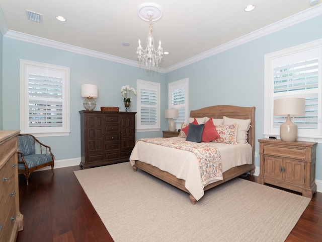 bedroom with baseboards, dark wood finished floors, and crown molding