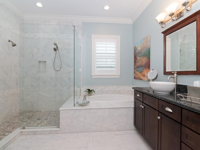 bathroom featuring a walk in shower, vanity, a bath, and crown molding